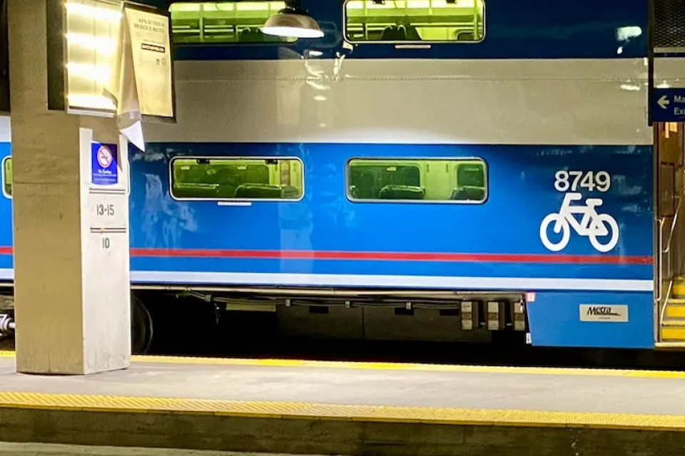 Blue Metra train bike car.